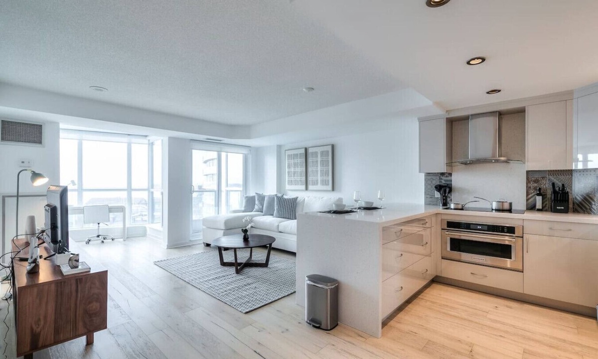 Toronto Entertainment District Condo | 2BR Downtown Gem With Workspace and CN Tower Views