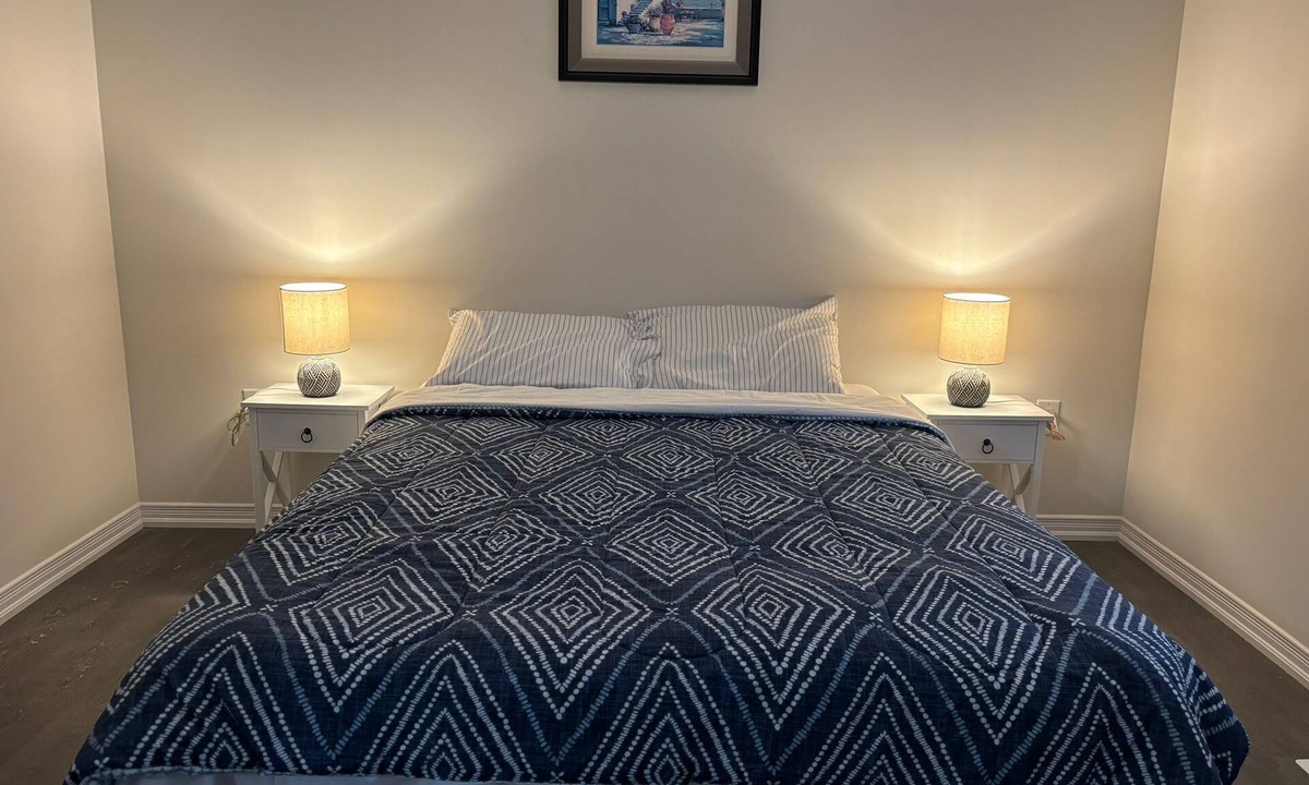 Thorold House | Bedroom Ensuite (Unit 1) @Welland, ON…a cozy bedroom space with jacuzzi