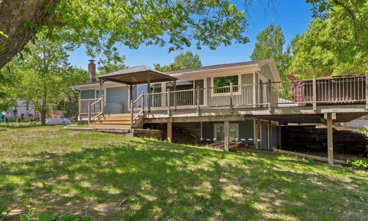 Webster House | Charming 3-bedroom Lake House with dock, hot tub, AC in delightful Waterville