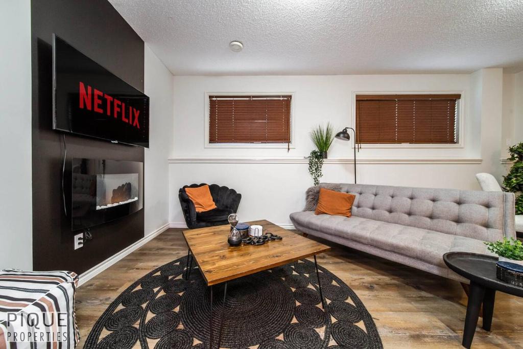 Jasper Place Apartment | Chic Modern Vibes - KING Bed - Fireplace - Sleeps 4 - Wifi