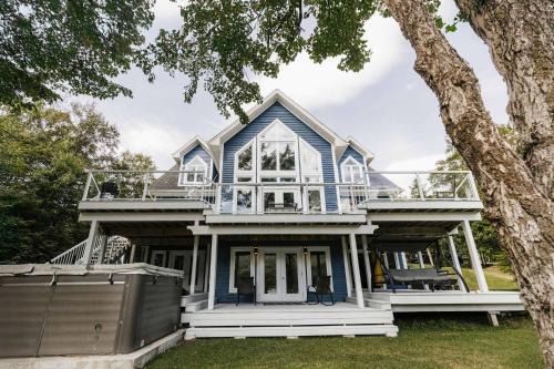 Humber Valley Ski Chalet | Luxurious Lakeside Chalet with Swim Spa