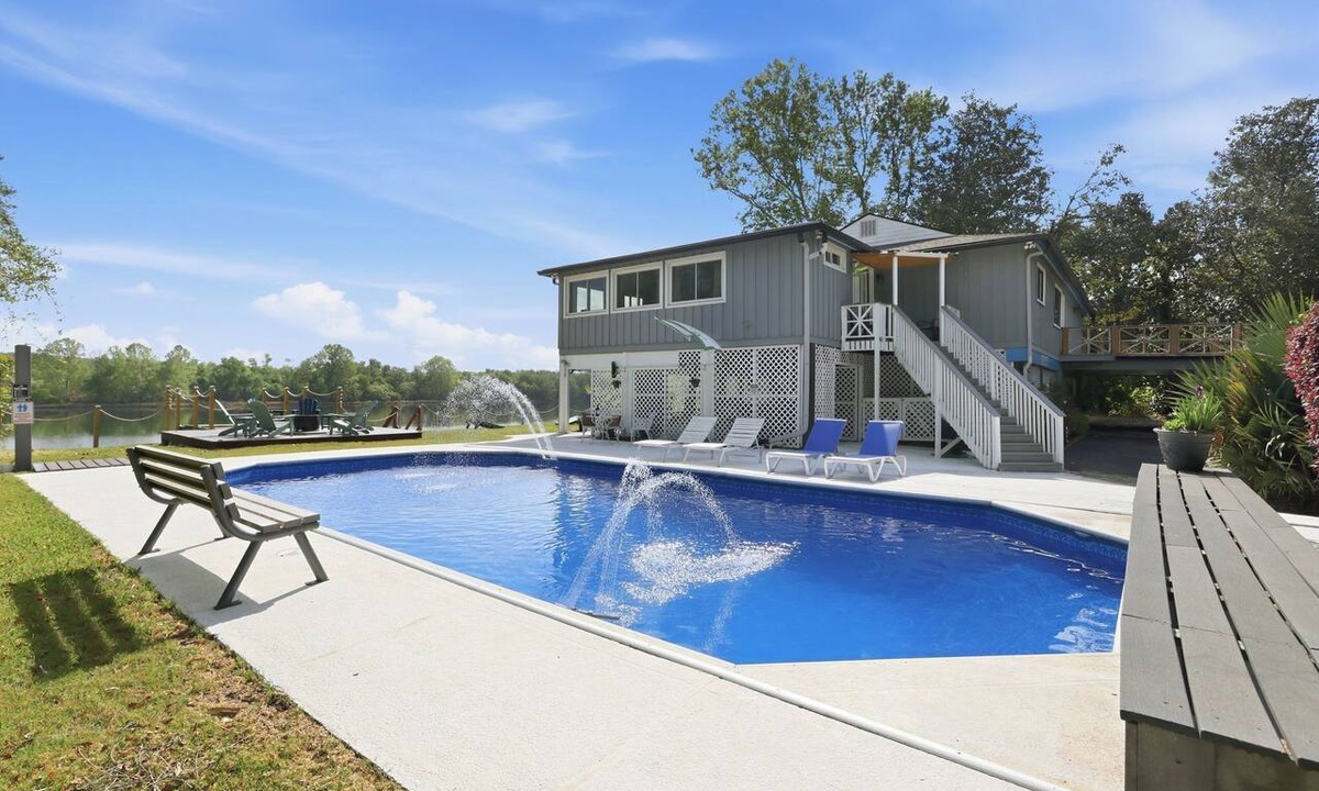 Industrial House | Luxury Riverfront Escape~Pool~BoatSlip~Kayaks~BBQ