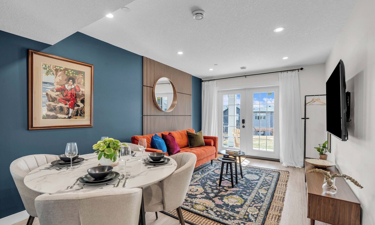 Calgary Apartment | Luxury Suite: King Bed, Workspace, Huge Lawn & Epic Sunset
