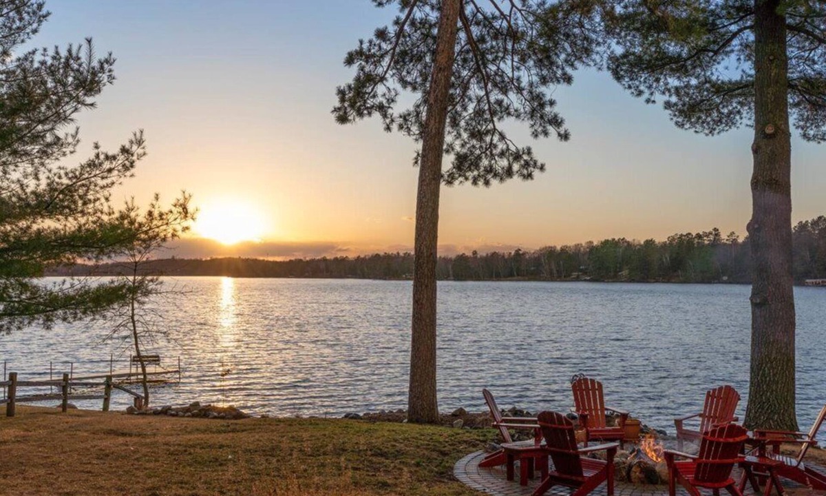 Emily House | Pristine home with sandy beach, firepit, dock and pontoon. ATV trails nearby.
