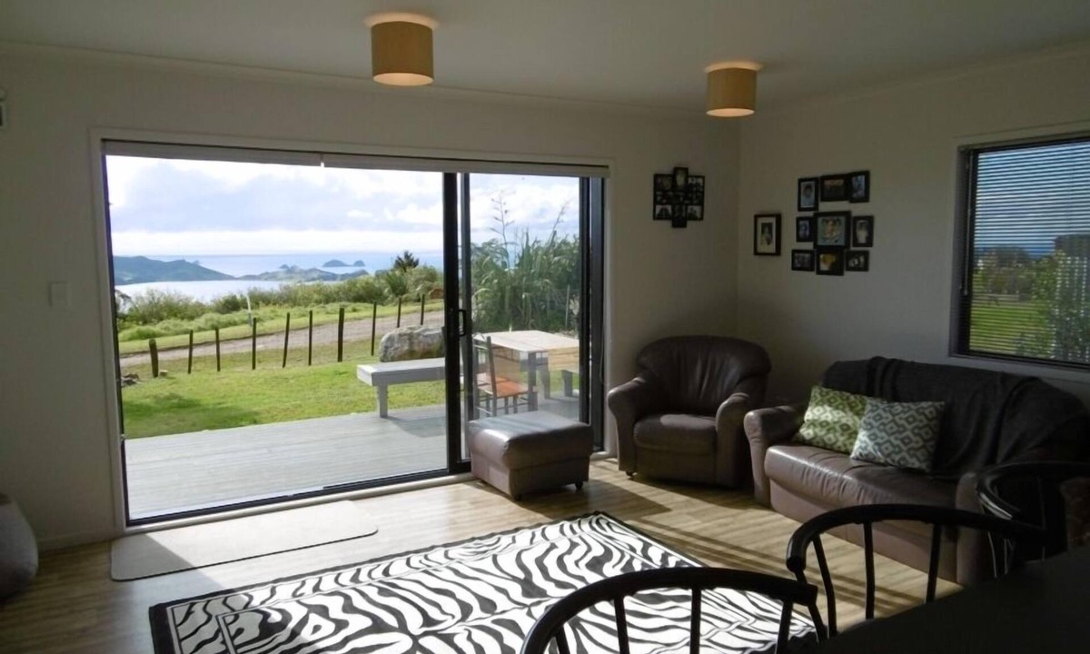 Matauri Bay House | Relax while taking in the expansive sea views