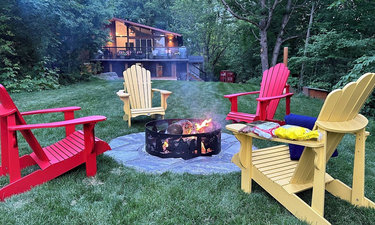 Georgian Bay Cottage | Renovated water front cottage w/firepit, multi level decks & screened in porch.