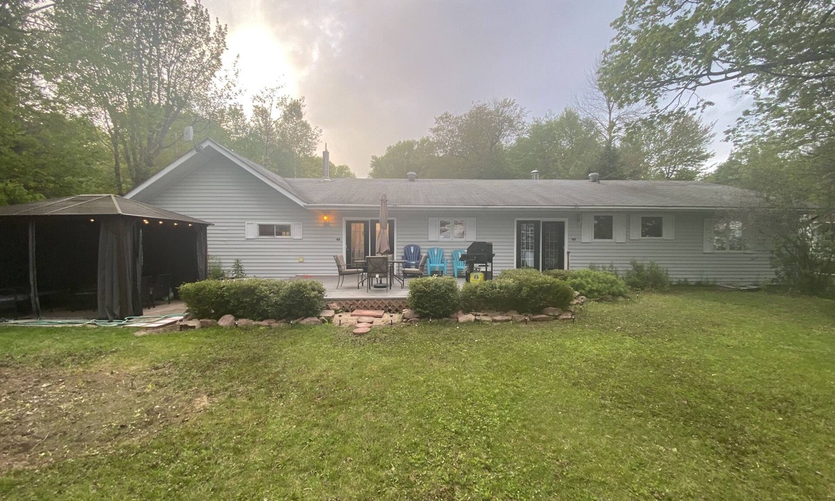 Algoma District Cottage | Spacious Cottage On Lake with Beach, Fire Pit, Kayaks, Pedal Boat & More!