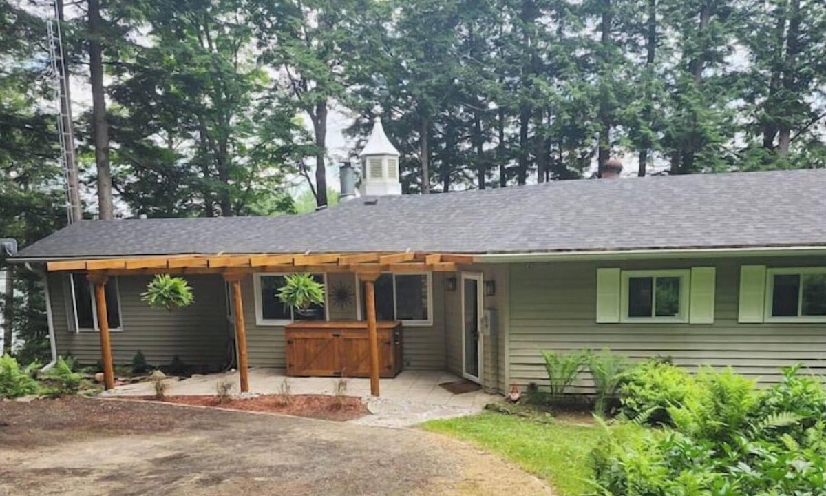 Haliburton House | Spacious, waterfront home surrounded by trees with large dock & games room.
