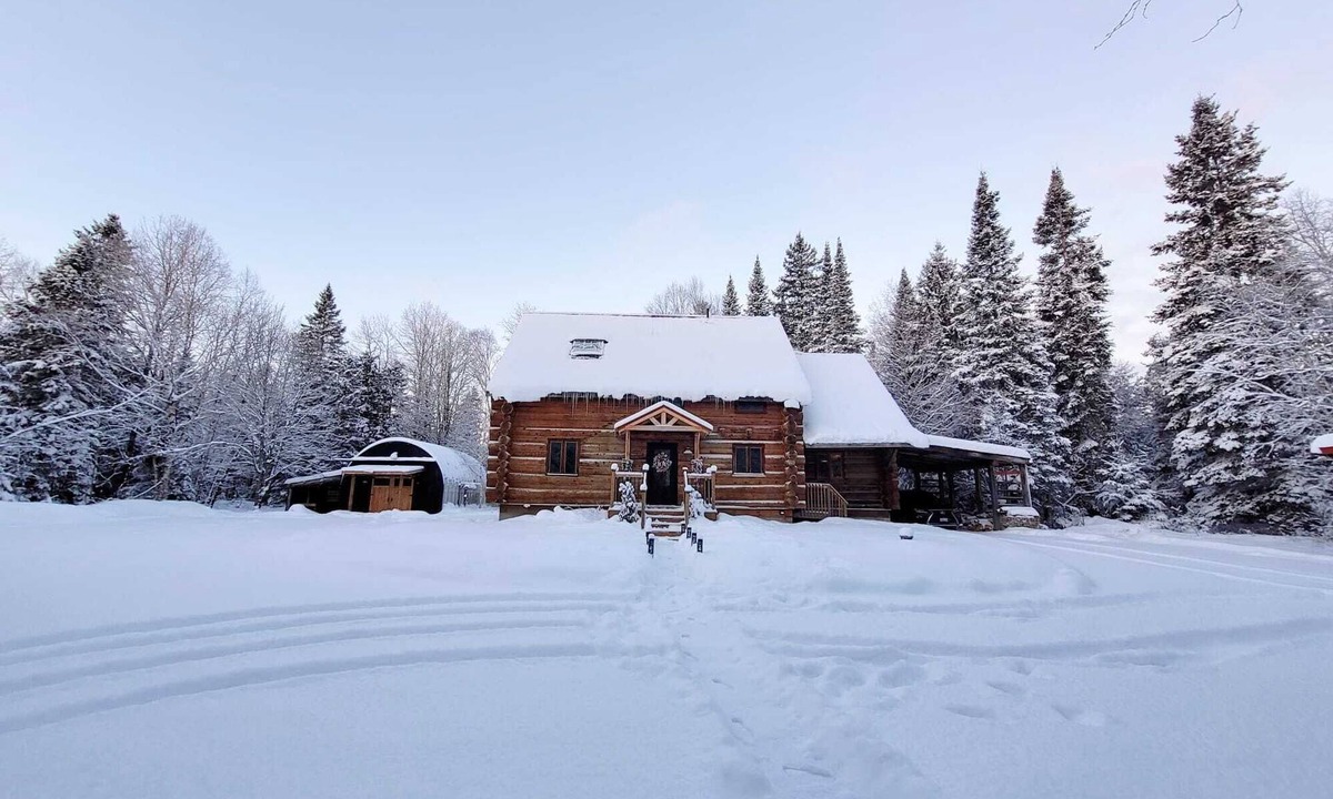 Lake St. Peter Cottage | The Wooded Oasis - Cozy Winter Cottage w/Hot Tub & Sunken Firepit