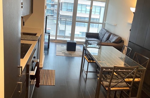 Toronto Entertainment District Condo | 2BD 1 Bath 4 Guests Parking Balcony Near CN Tower Downtown—By Hostia
