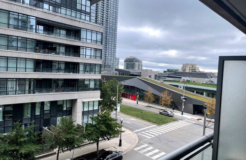 Toronto Entertainment District Condo | 2BD 1 Bath 4 Guests Parking Balcony Near CN Tower Downtown—By Hostia