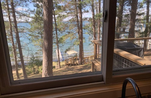 Longville Cabin | Cabin Nestled Amongst Towering Pines Bluff Overlooking nMain Body of Woman Lake