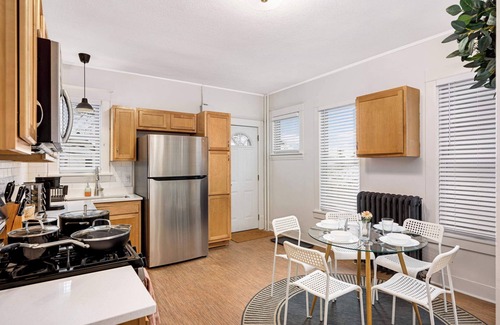 Summit - University House | Cozy Chic Retreat: 3BR Duplex in St. Paul