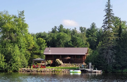 Golden Lake Cottage | Family Oriented waterfront Log Cabin with new hot tub and sauna.