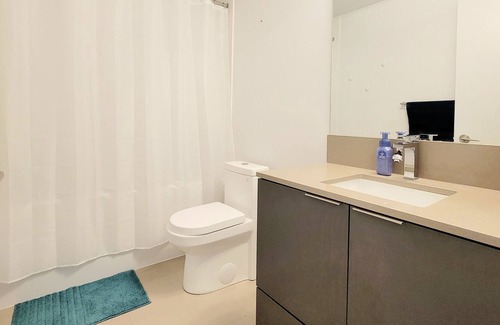 Garden District Condo | Modern 1+1 Bedroom Condo Steps Away from Vibrant Dundas Square