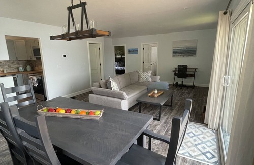 Stone Mills Cottage | Modern, Sunset-Facing Waterfront Cottage