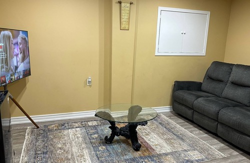 Brampton House | 1 bedroom basement suite with spacious living room and laundry, no kitchen.