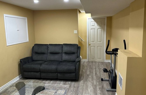 Brampton House | 1 bedroom basement suite with spacious living room and laundry, no kitchen.