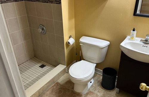 Brampton House | 1 bedroom basement suite with spacious living room and laundry, no kitchen.