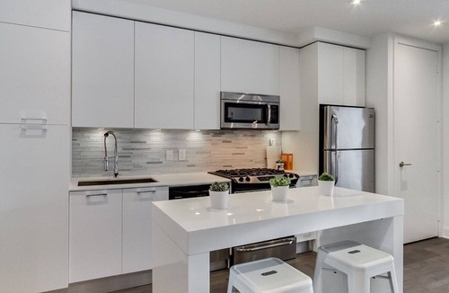 Wellington Place Condo | 100% Walk Score! NEW Large, High Ceilings, Designer Luxury Open Style Live/Work!