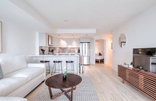 Toronto Entertainment District Condo | 2BR Downtown Gem With Workspace and CN Tower Views