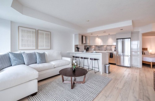 Toronto Entertainment District Condo | 2BR Downtown Gem With Workspace and CN Tower Views