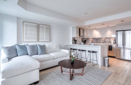 Toronto Entertainment District Condo | 2BR Downtown Gem With Workspace and CN Tower Views