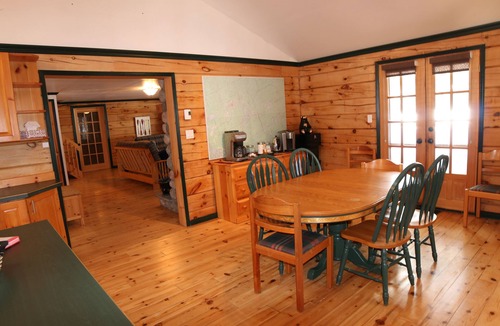 Algonquin Highlands Cottage | 4-Season Private Log Cottage on Kawagama Lake, fireplaces, sunroom, dock, Wifi