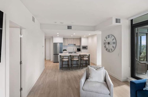 South Pandosy Apartment | Aqua Waterfront Corner Unit, Lake & Sunset Views