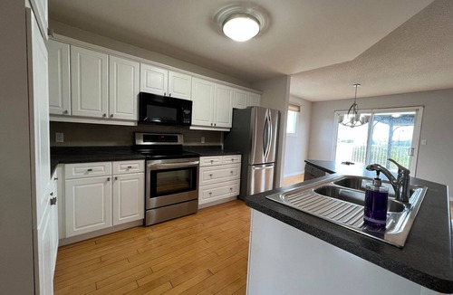 Kingston House | Arbour Ridge Vacation Home - Trail View! 5 bedrooms, 7 beds