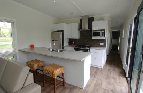 Pointe aux Roches Cottage | Beautiful modern cottage for rent located on a golf course