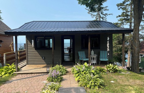 Whipholt Cabin | Boutique cabin that is feet from Leech Lake. Enjoy the Million dollar view.