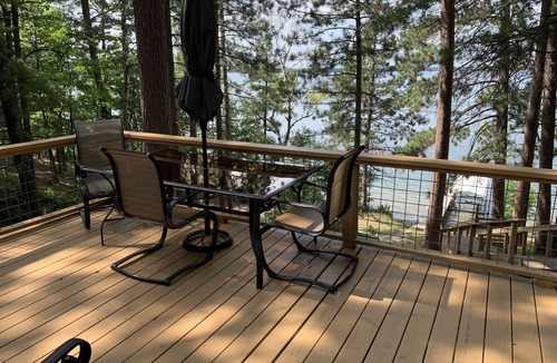Longville Cabin | Cabin Nestled Amongst Towering Pines Bluff Overlooking nMain Body of Woman Lake