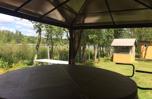 Kettle River House | Cabin with outdoor hot tub and view of Second Lake!