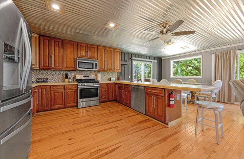 Webster House | Charming 3-bedroom Lake House with dock, hot tub, AC in delightful Waterville