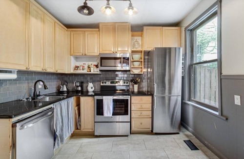 The Beaches House | Charming Beaches Century House, Steps to the Beach & Shops, Downtown in 10 min!