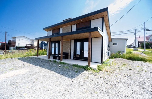 Cheticamp House | Charming Dockside Escape: Life by the Ocean