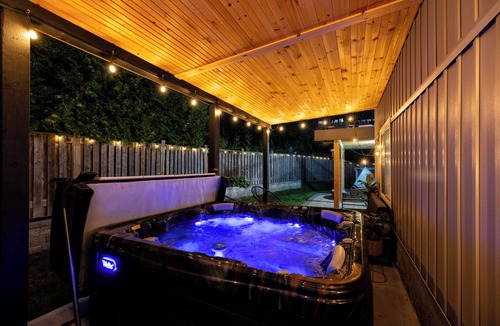 Port Hope House | Charming walk out basement fitness room, hot tub in enchanting Port Hope