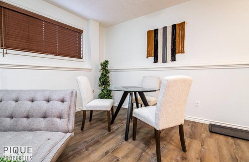 Jasper Place Apartment | Chic Modern Vibes - KING Bed - Fireplace - Sleeps 4 - Wifi