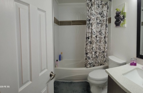 Durham Region House | Clean apartment with 4 free parking spaces.