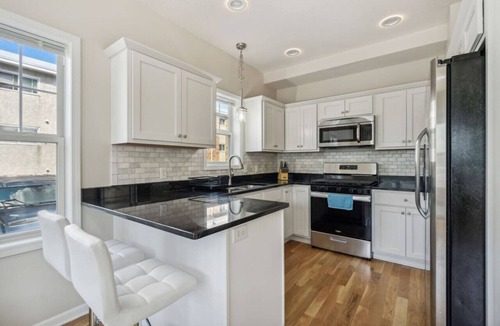 East Isles House | Colfax Flat 5BR 3.5BA Apartment near Uptown