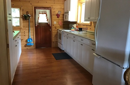 Minden House | Cottage on Horseshoe Lake, Minden, level lot, south facing, sandy beach