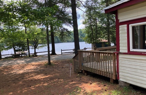 Minden House | Cottage on Horseshoe Lake, Minden, level lot, south facing, sandy beach