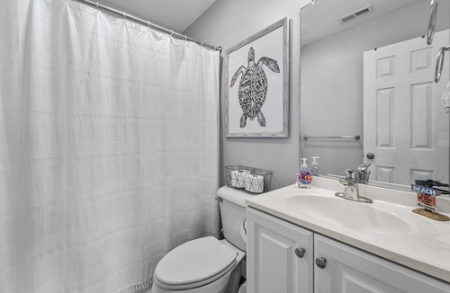 Colington Apartment | Cozy beach get away situated between the ocean and sound. Pet friendly!