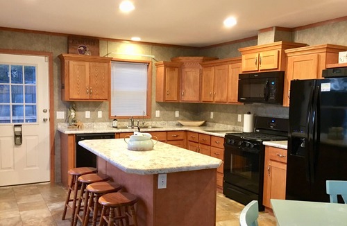Maple Lake House | Cozy Beach Getaway with Private Sandy Beach & Dock, 2 Paddle Boards, & 2 Kayaks