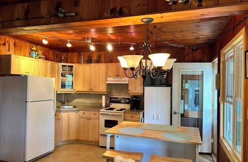 Minden Hills Cottage | Cozy Cove on Gull LakenGetaway to your own cove with swim up dock and sand beach