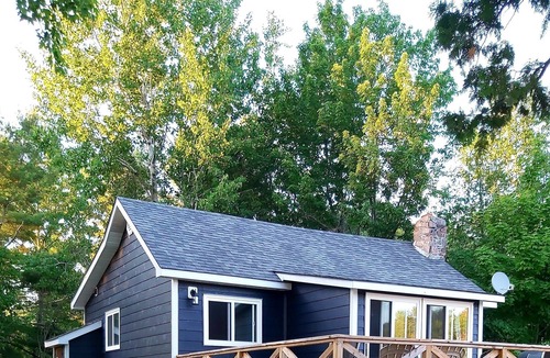 Magnetawan Cottage | cozy lakefront cottage with firepit and boat dock
