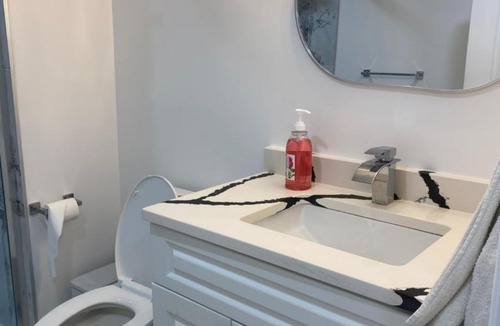 Woodslee Apartment | Cozy Private Basement Suite East Windsor