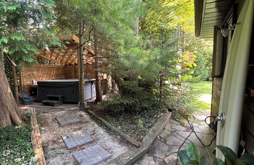 Sauble Beach Cottage | Cozy private beach house with fire pit and hot tub in the heart of Sauble Beach.