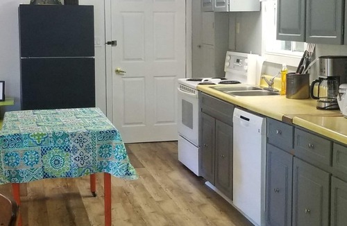 Novar Cottage | Cozy Sunset Cabin located lakeside in family friendly campground